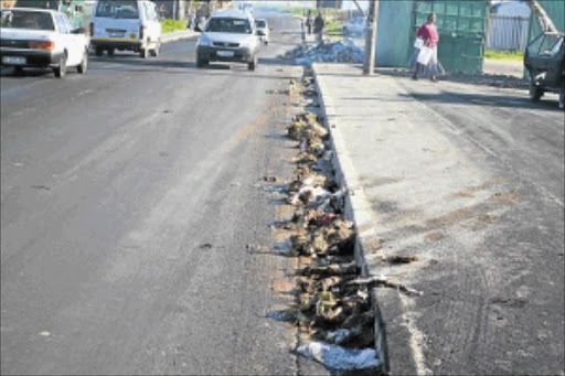 HEALTH RISK: Lansdowne Road after France residents dumped waste on the pavement. PHOTO: Unathi Obose