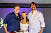 Devin Heffer with Hollywoodbets brand ambassadors Eben and Anlia Etzebeth.