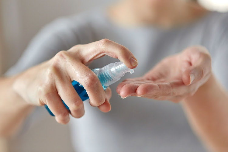 The World Health Organisation (WHO) says it's safe to use a communal hand sanitiser.