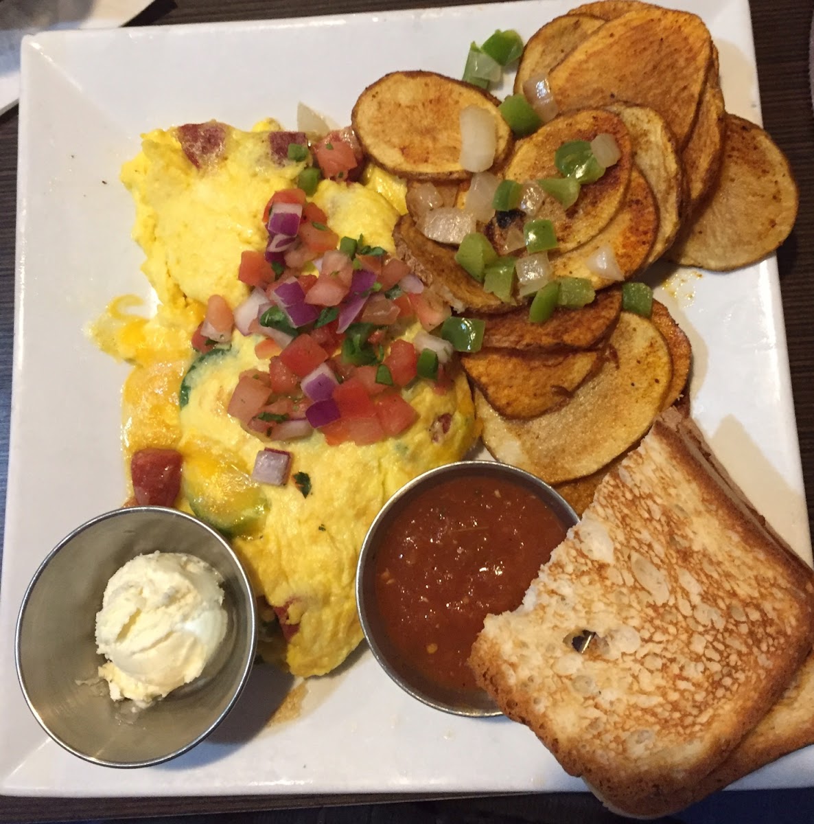 Chorizo omelet, potatoes, and GF toast