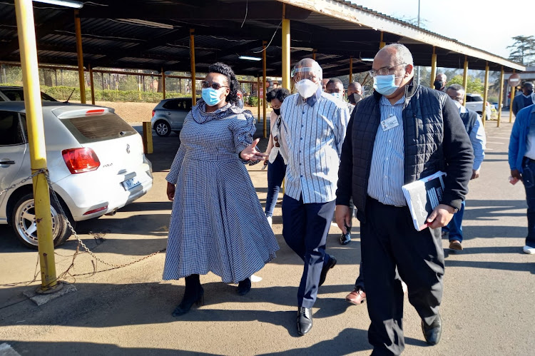 KwaZulu-Natal health MEC Nomagugu Simelane-Zulu, health minister Zweli Mkhize and acting district manager Mark Green in the parking lot that was used as a makeshift ward at Northdale Hospital in Pietermaritzburg on August 8 2020.