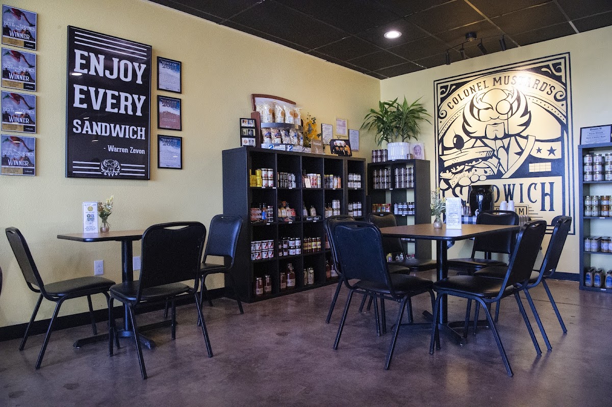 Our dining room. In addition to the tastiest sandwiches in town, we offer salads, sweets (including GF cupcakes & scones), soups, espresso drinks, local craft beers (including HOLIDAILY GF BEER) and GF sides. We also have over 100 gourmet mustards from all over the globe for sale.