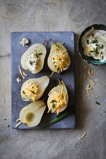 Cheese-stuffed poached pears Sweet meets savoury in this posh snack, which can also be served as a light meal with a large rocket salad.