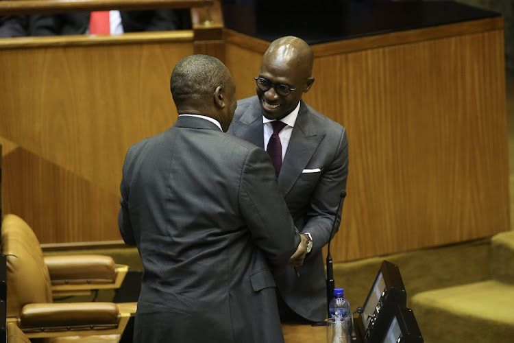 Finance Minister Malusi Gigaba congratulated by President Cyril Ramaphosa following his 2018 Budget speech in Parliament, Cape Town.
