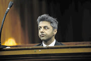 BI-GUY: Shrien Dewani revealed shocking information about his sex life but also noted details of exchange-rate discrepancies when he exchanged money in Cape Town
