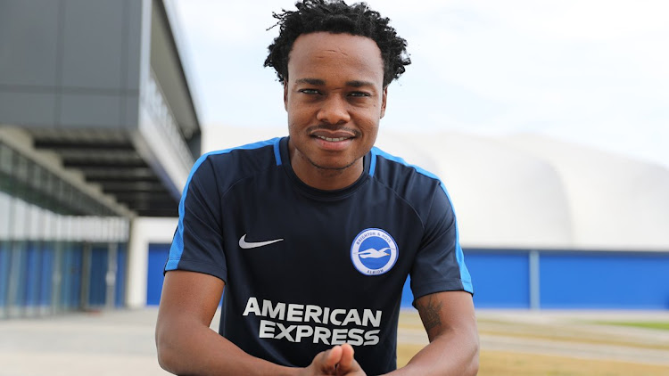 Brighton and Hove Albion have completed the signing of striker Percy Tau from Sundowns.