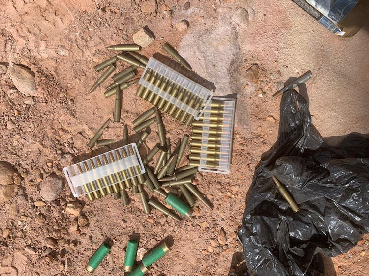 Four miners were found in possession of unlicensed firearms and ammunition including automatic weapons, a shotgun and explosives in a police raid this week.