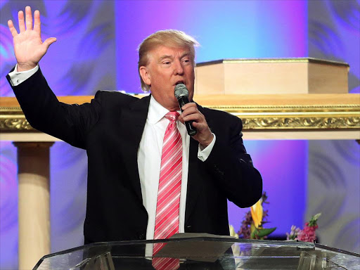 Republican presidential nominee Donald Trump attends a church service in Detroit, Michigan, US, September 3, 2016 /REUTERS