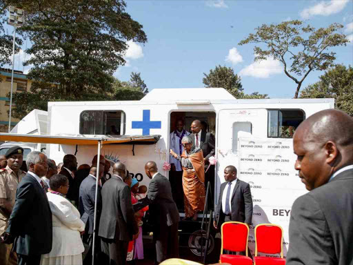 First Lady Margaret Kenyatta hands over the 46th Beyond Zero mobile clinic to Murang'a Governor Mwangi Wairia, August 17, 2016. /PSCU