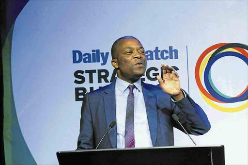 Political analyst and television personality Justice Malala addresses the audience at the Daily Dispatch Strategic Business Summit at Hemingways yesterday Picture: SINO MAJANGAZA