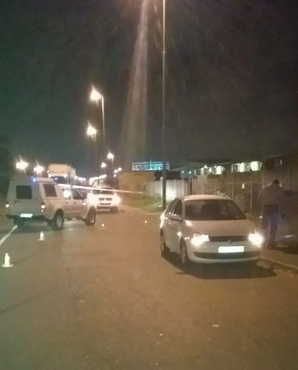 Cops on the scene of a shooting on Musa Dladla Drive in Wentworth, south of Durban, on Tuesday night.