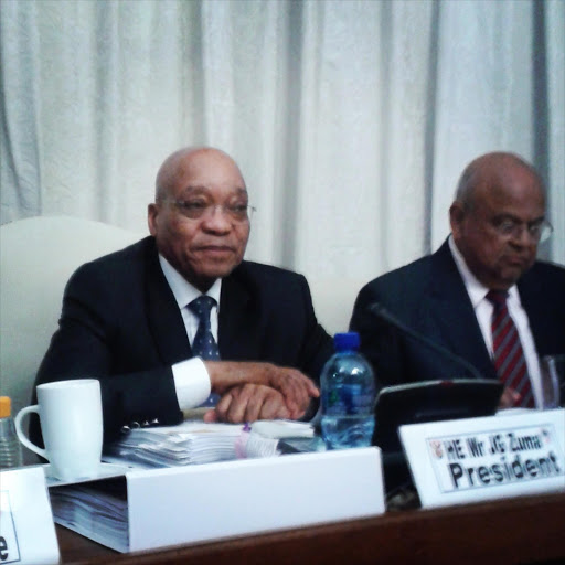 President Jacob Zuma and Minister of Cooperative Governance and Traditional Affairs Pravin Gordhan (L).
