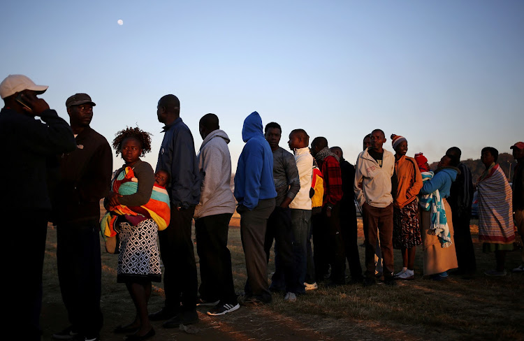 Zimbabwean voters queue to cast their ballots in the country's general elections in Harare on July 30 2018. The MDC Alliance went to court on Friday to legally challenge the results.