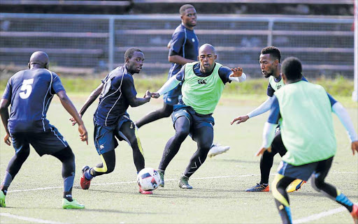 GETTING IN TUNE: Chippa United players seen at training in East London before their clash against Ajax this weekend Picture: MICHAEL PINYANA