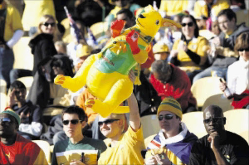 ELATED: Socceroos fans before their game against Ghana in Rustenburg. Pic: SIMPHIWE NKWALI. 19/06/2010. © St Ghana vs Australia during the group stages of the 2010 FIFA World Cup qualifiers at Rustenburg. Soccer fans ahed of the kick-off. Picture: SIMPHIWE NKWALI/ 19/06/2010