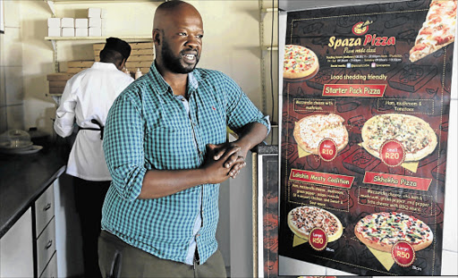 ADDING FLAVOUR: Onke Maqaqa, from East London, at his Spaza Pizza outlet in Nompumelelo location. INSET: The mouthwatering menu Pictures: MICHAEL PINYANA