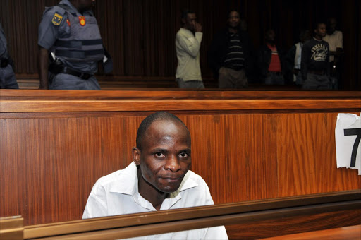 Ananias Mathe in the Johannesburg high court. He pleaded guilty to two charges of escaping from custody but pleaded not guilty to several charges of rape, robbery, theft and attempted murder. Pic: VATHISWA RUSELO. 17/02/2009. © Sowetan.