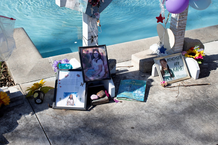 Memorial crosses for Tess Mata and Eliahna Torres line a fountain in the town square, as U.S. Attorney General Merrick Garland announces the results of a review into the law enforcement response to a 2022 mass shooting at Robb Elementary in Uvalde, Texas, US, January 18, 2024.