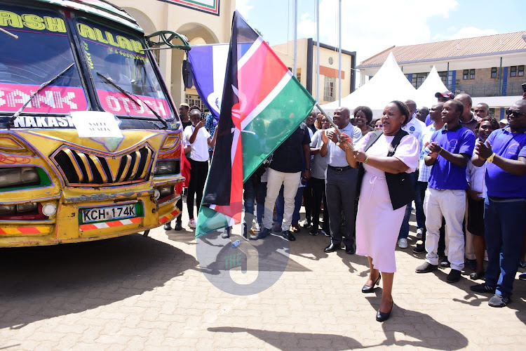 CS Florence Bore flags off bus carrying Kenyans who are set to fly out to Saudi Arabia and Qatar for work on February 6, 2024
