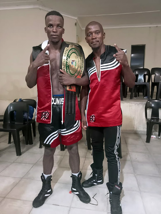 KZN lightweight champ Sandile Dumisa with trainer Bhunu Mthalane.