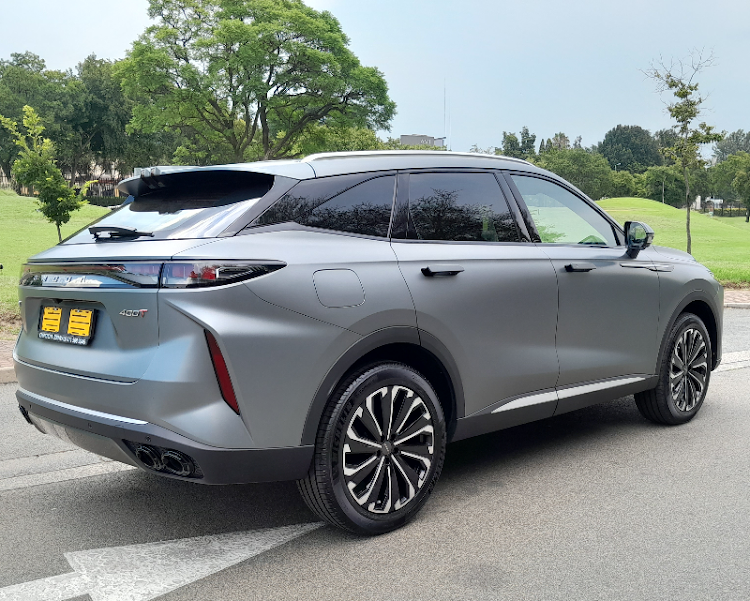 Stunning 20-inch alloys and a matte grey paint elevate the premium air around this new Omoda SUV.