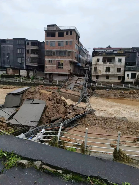 A view of a bridge that collapsed amid heavy rains, in Xiaosanjiang town, Guangdong, China in this screen grab obtained from a social media video released on April 21, 2024. Video Obtained By Reuters/via REUTERS (THIS IMAGE HAS BEEN SUPPLIED BY A THIRD PARTY. NO RESALES. NO ARCHIVES.)