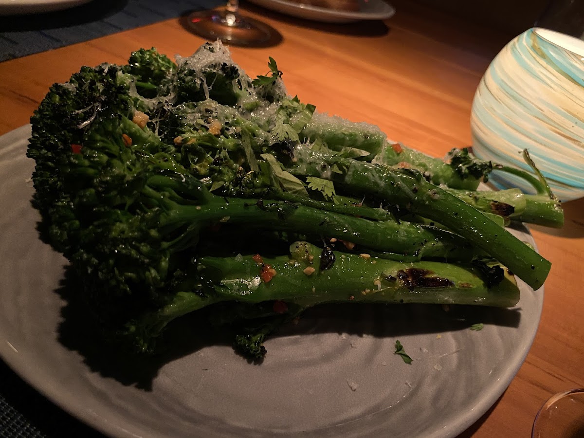 Charred broccolini with marcona almonds and cheese