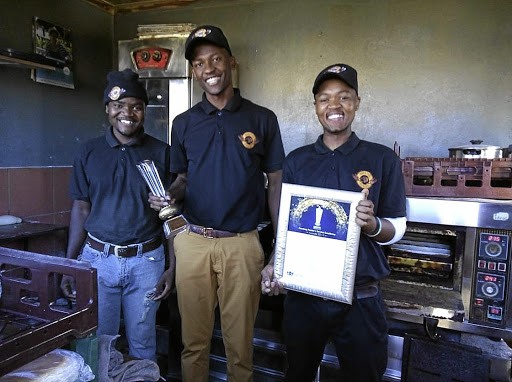 Borotho Bakery Enterprise owner Refiloe Rantekoa, middle, and his colleagues Mthokozisi Ndlovu and Rantimane Francis.