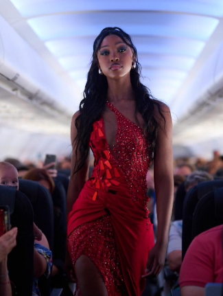 A model dressed in Scalo takes the 'runway' on a flight from Johannesburg to Cape Town on Valentine's Day morning.