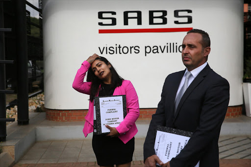 Renisha Jimmy and lawyer Rod Montona outside the National Consumer Commission in Pretoria, where they planned to hand over a file containing information related to people affected by the fault on Ford Kuga vehicles, on 16 January 2017.