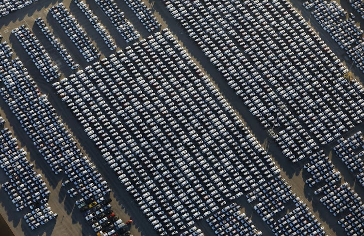 China's car exports surged to a record high in April, data showed on Friday, as domestic sales slipped 5.8% from a year earlier amid intensifying price competition and consumers' caution about spending on big items during a shaky economic recovery.