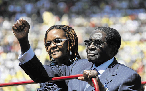 Zimbabwean President Robert Mugabe and his wife Grace at his inauguration in Harare yesterday for a new five-year term