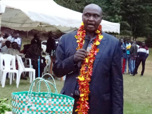 Baringo Central MP Sammy Mwaita addressing the public during women groups fund raiser in Kapropita on Saturday. he was accompanied by Baringo Governor Benjamin Cheboi and Women Representative Grace Kiptui. They dismissed claims that KANU was in coalition with jubilee government. PHOTO/JOSEPH KANGOGO