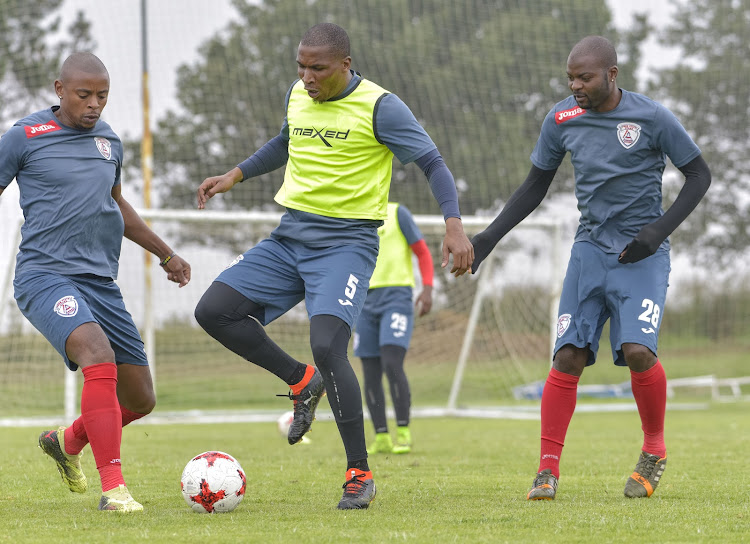 From left to right: Free State Stars defender Tamsanqa Teyise, captain Paulus Masehe and Rooi Mahamutsa during their Nedbank Cup training and media day at the club's Academy in Bethlehem on Tuesday April 18 2018.