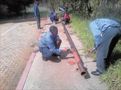 PRACTICAL LESSON: Teacher Lebohang Mphure teaches skills to pupils at Klipspruit West Secondary School. PHOTO: Supplied