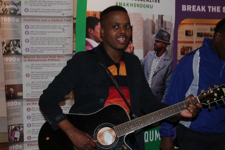 Maskandi artist, Khuzani Mpungose, performing a song promoting medical male circumcision.