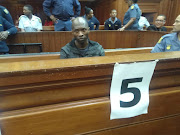 Luyanda Botha during his sentencing in the high court in Cape Town. He received three life sentences for the rape and murder of UCT student Uyinene Mrwetyana. 