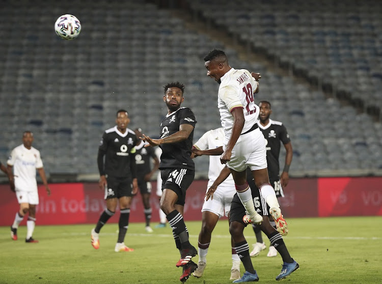 Nathan Sinkala of Stellenbosch FC scores after he wins a header against Thulani Hlatshwayo of Orlando Pirates during the DStv Premiership match between Orlando Pirates and Stellenbosch FC at Orlando Stadium on October 28 2020.