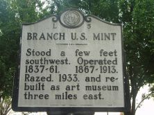 Stood a few feet southwest. Operated 1837-61, 1867-1913. Razed, 1933, and rebuilt as art museum three miles east.Plaque via North Carolina Highway Historical Marker Program, and is used with their...