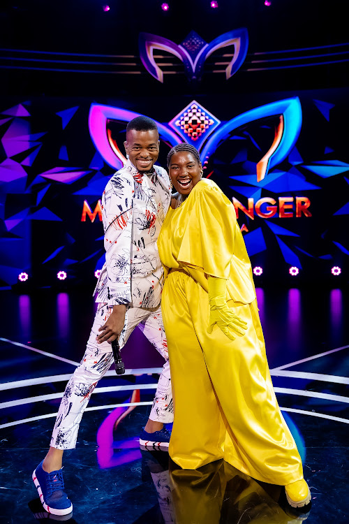 Host Mpho Popps and the unmasked Star aka Nonkanyiso 'LaConco' Conco on the Masked Singer SA