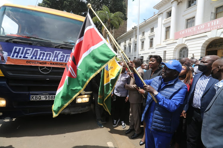 Raila Odinga and Nairobi Governor Ann Kananu flag off a caravan to launch mass voter registration in Nairobi on January 18, 2022. Photo/ Fredrick Omondi