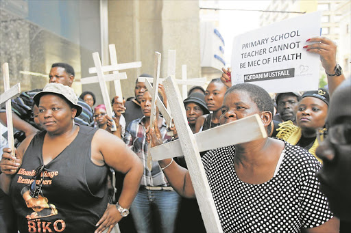 Family members of psychiatric patients who died earlier this year hold an ‘Esidimeni 37’ prayer vigil outside Gauteng Health MEC Qedani Mahlangu’s offices yesterday. The 37 patients died after being transferred from Life Esidimeni into the care of NGOs. Findings of the investigation into the tragedy would be released next month, health ombudsman Professor Malegapuru Makgoba said. Picture Creditc: Antonio Muchave. ©Sowetan