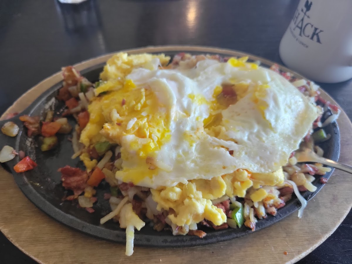 Cornbeef skillet with extra eggs and cheese. No spicy mustard.