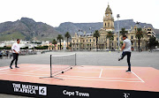 Roger Federer and Rafael Nadal lark about on the Grand Parade in Cape Town on February 7 2020.