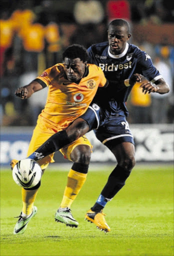 MY BALL: Kingston Nkhatha, left, of Kaizer Chiefs fights for the ball with Kwanda Mngonyama of Bidvest Wits during their Absa Premiership match at Bidvest Stadium in Johannesburg last night Photo: Veli Nhlapo