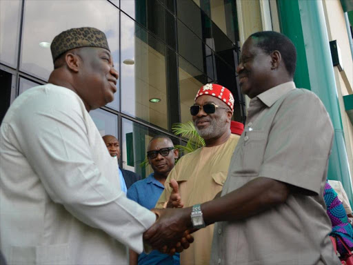 Cord leader Raila Odinga with Enugu State Governor Ifeanyi Ugwuany at the State headquarters in Enugu. /COURTESY