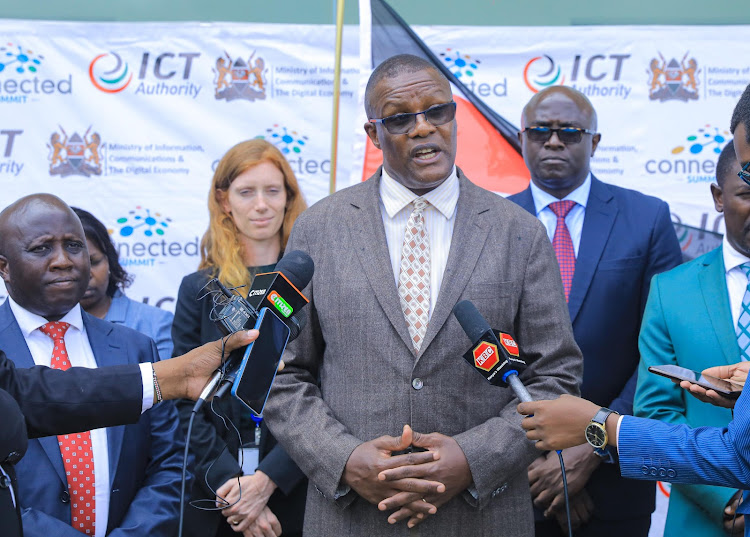 ICT and Digital Economy CS Eliud Owalo speaking during a media briefing at Uhuru Gardens in Nairobi ahead of the Connected Africa Summit 2024