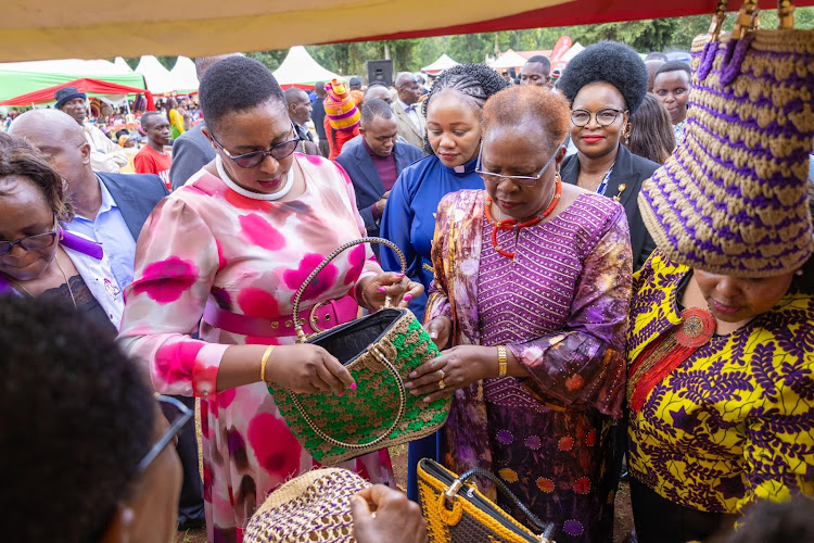 Gender CS Aisha Jumwa and Lands CS Alice Wahome during Kigumo basket weavers expo and fundraising.