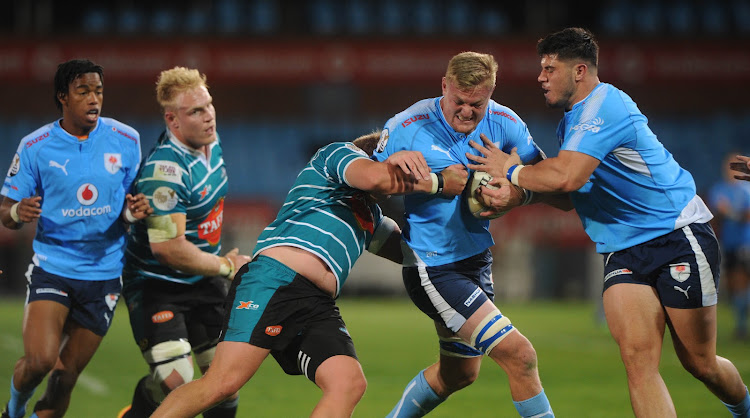 Jano Venter of Blue Bulls is tackled by AJ le Roux of Griquas during the Currie Cup Rugby match on September 1 2017 at Loftus Versfeld Stadium.