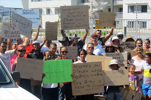 Braaf family members protesting over their claim to a portion of the Cape Town International airport land.